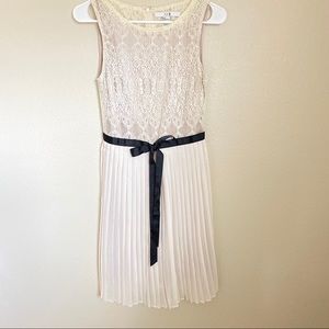 Lace and pleated cream colored dress